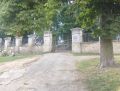 wejście na cmentarz parafialny w Ćmielowie - miejsce wiecznego spoczynku tysięcy parafian