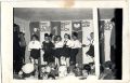 1959 r. Stara szkoła w Krzczonowicach - akademia patriotyczna ku czci 1 Maja. Od prawej - Ania Stan ( rocznik 1949 ), Jasiu Labuz, NN, Tereska Oficjalska, NN, NN NN, Grażynka Rutkowska. Z lewej stoi Pan Kazimierz Głębicki- kierownik Szkoły i na harmonii gra Pan Marian Krzak. Wśród publiczności - Michał Rużalski i Tomek Ojczymek. Oświetlenie jeszcze lampą naftową. Zdj. nadesłała Maria Libuda c. Stanisława 30.08.2009 r.